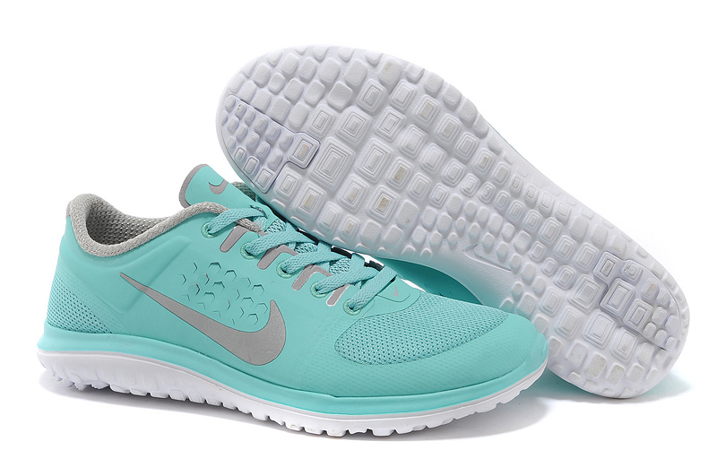 turquoise nike runners